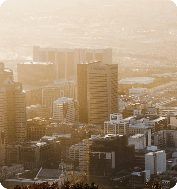 Foggy skyline of Cape Town buildings - SAAD Investment Holdings